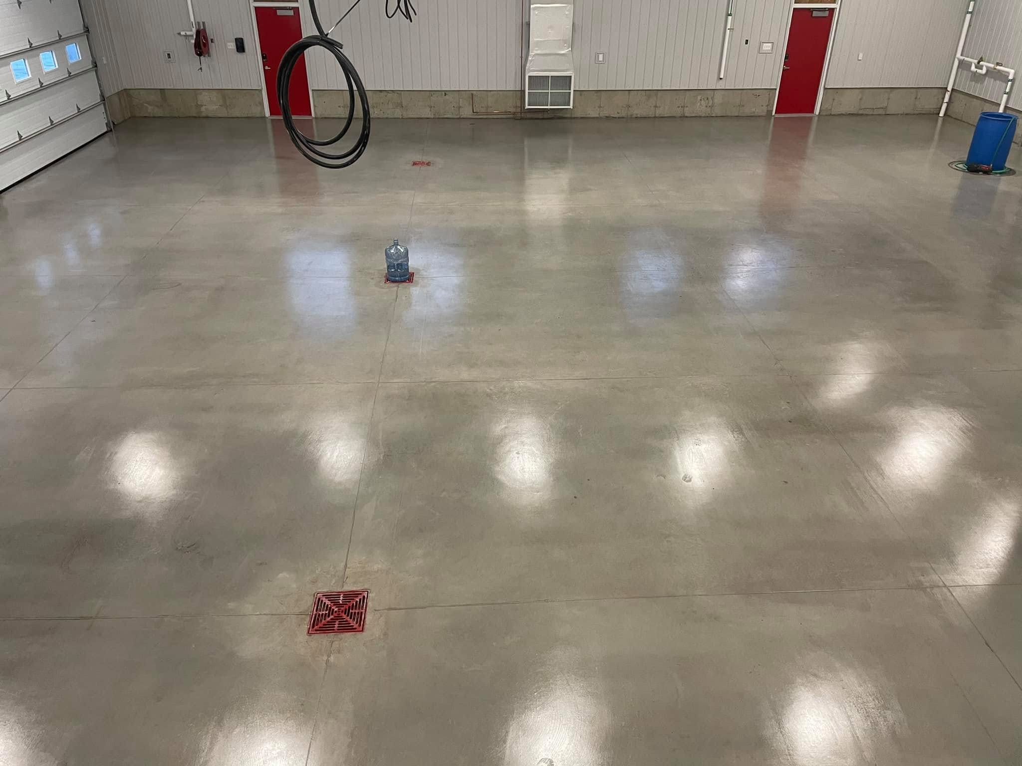 Sealed concrete floor in a spacious commercial work area