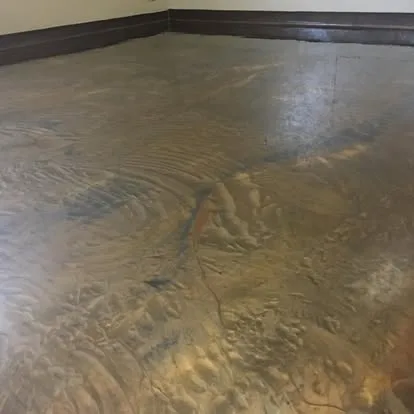 Close view of a bronze metallic floor with flowing rippled colour movement